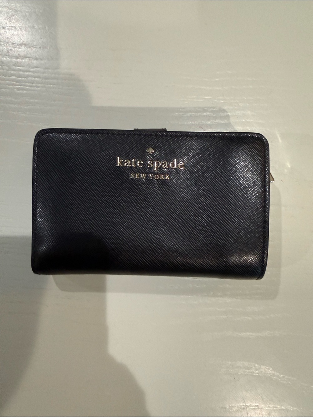 kate spade black Saffiano leather zip-around wallet